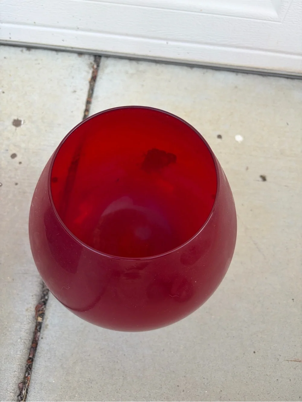 Large red glass snifter